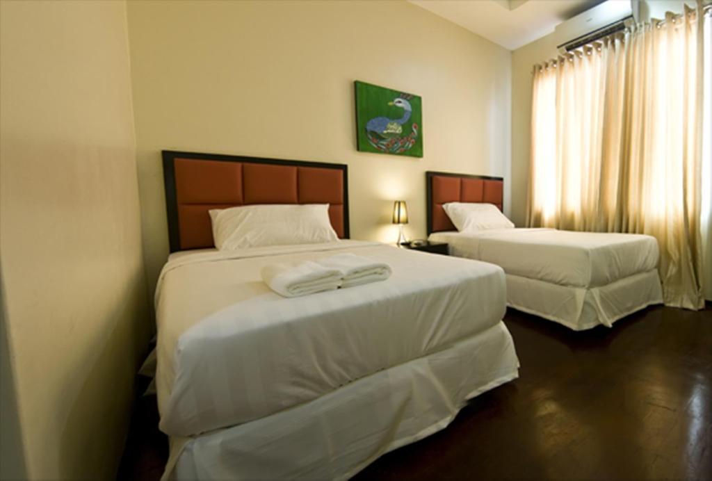 Arabelle Suites Tagbilaran City Room photo